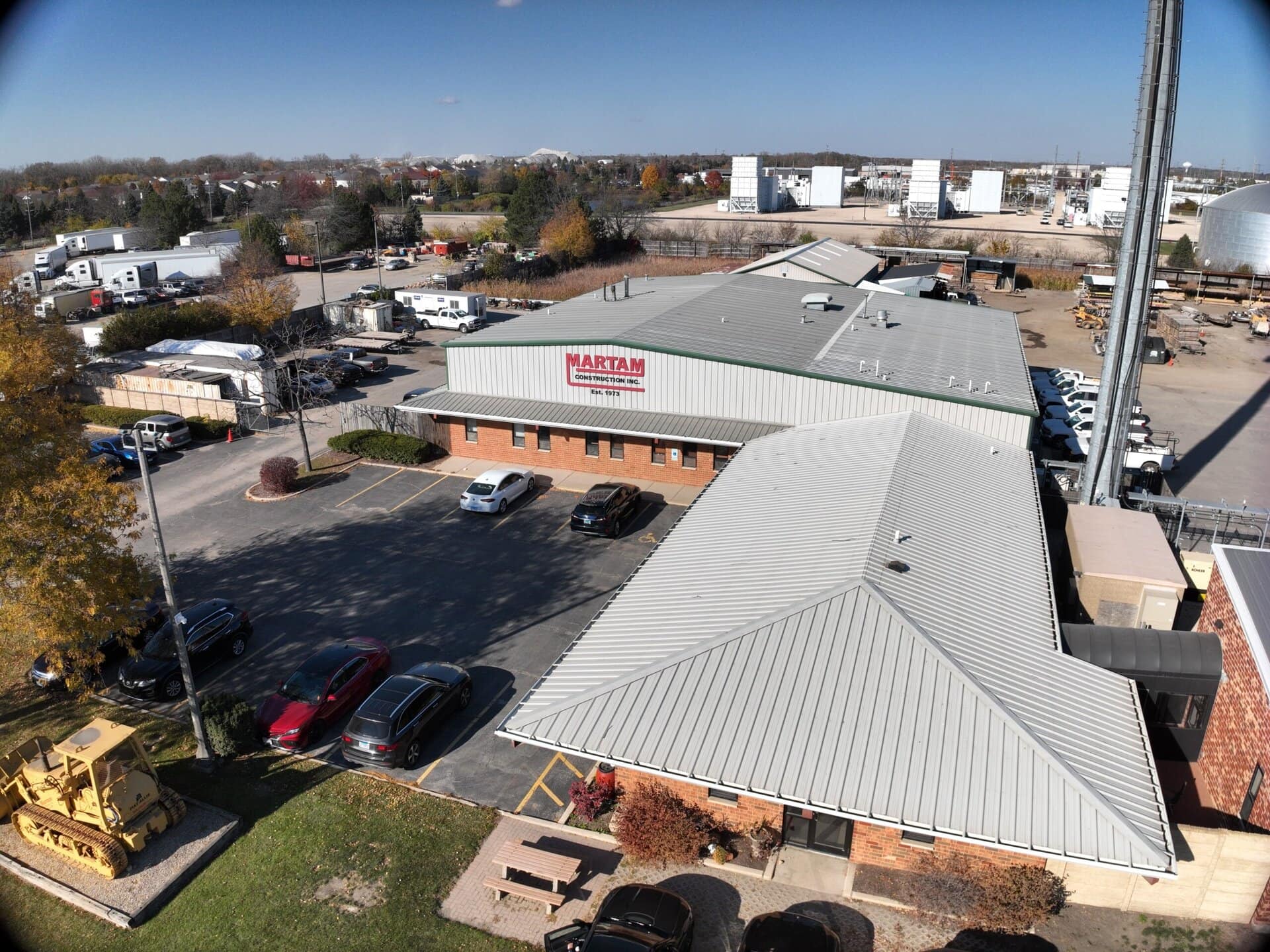 Building exterior of Martam Construction facility in a commercial area.